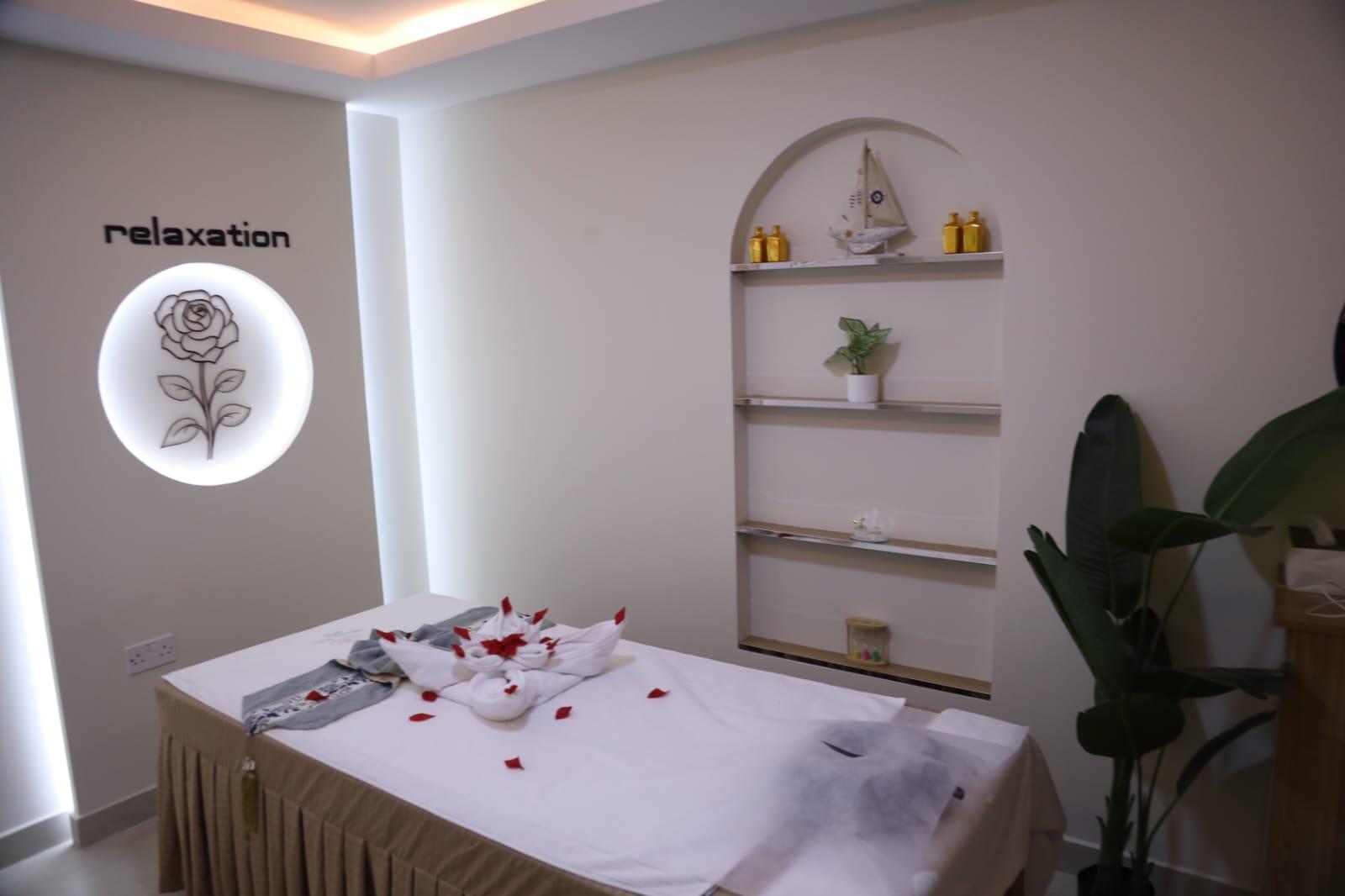 Relaxation treatment room styled with rose petals